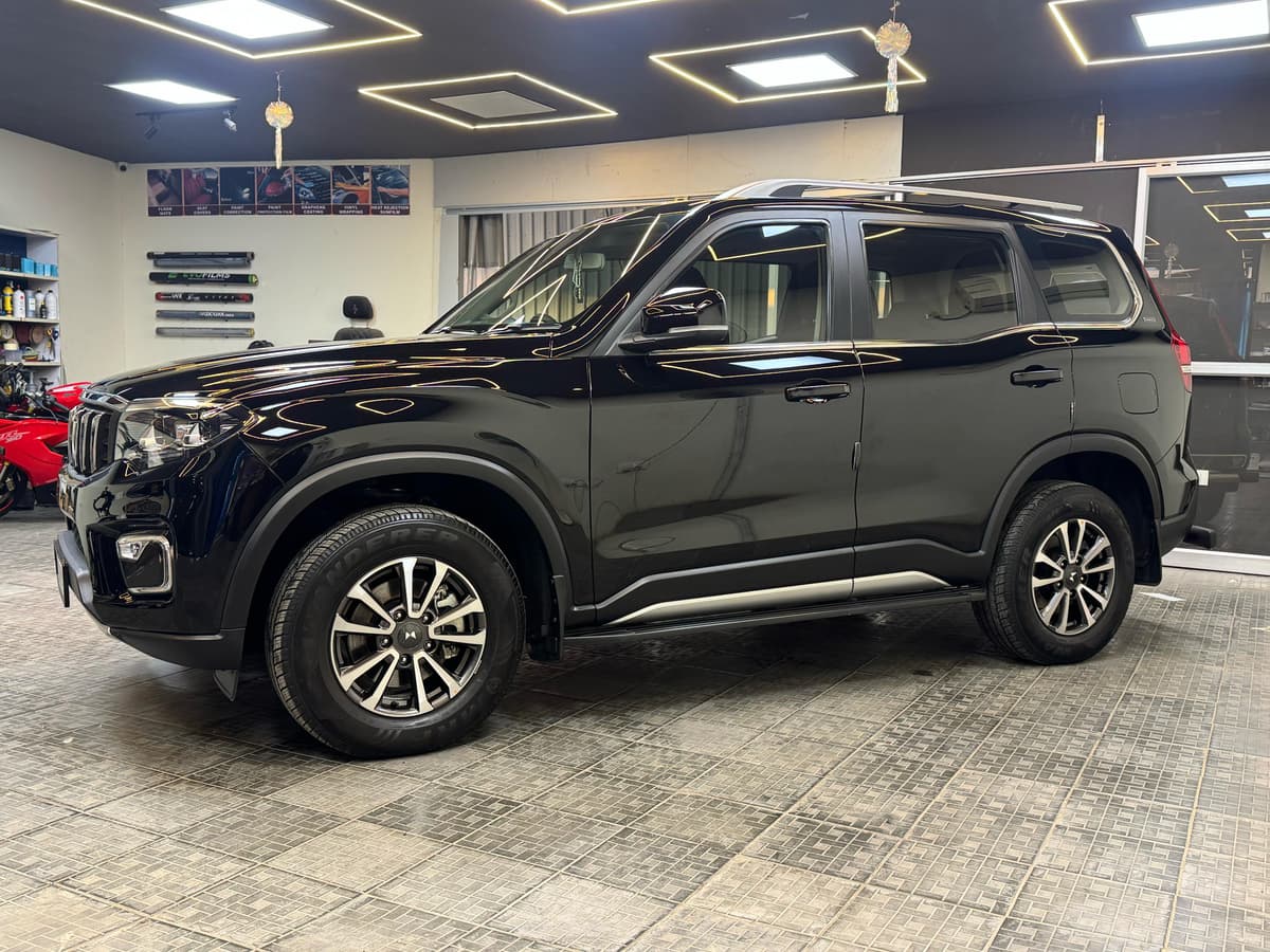 Black Mahindra Scorpio-N graphene coating side view